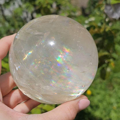 Honey Calcite Sphere with many rainbows