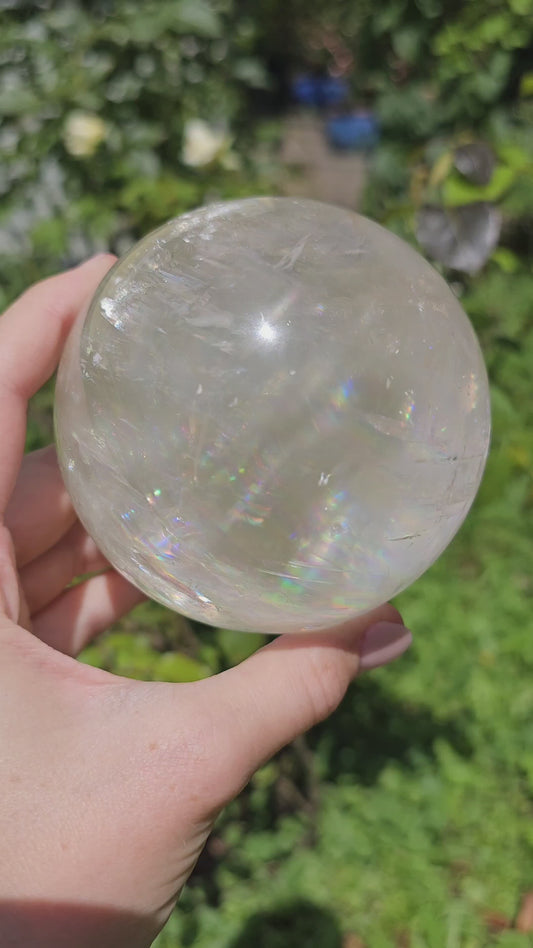 Honey Calcite Sphere with many rainbows