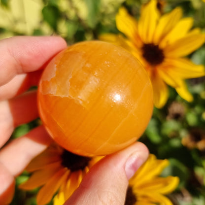 Orange Calcite sphere #43K